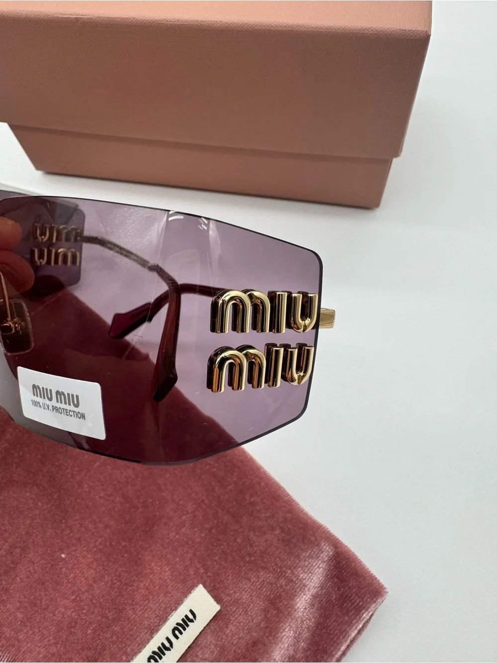 Miu Miu Purple Rimless Sunglasses with Gold Accents